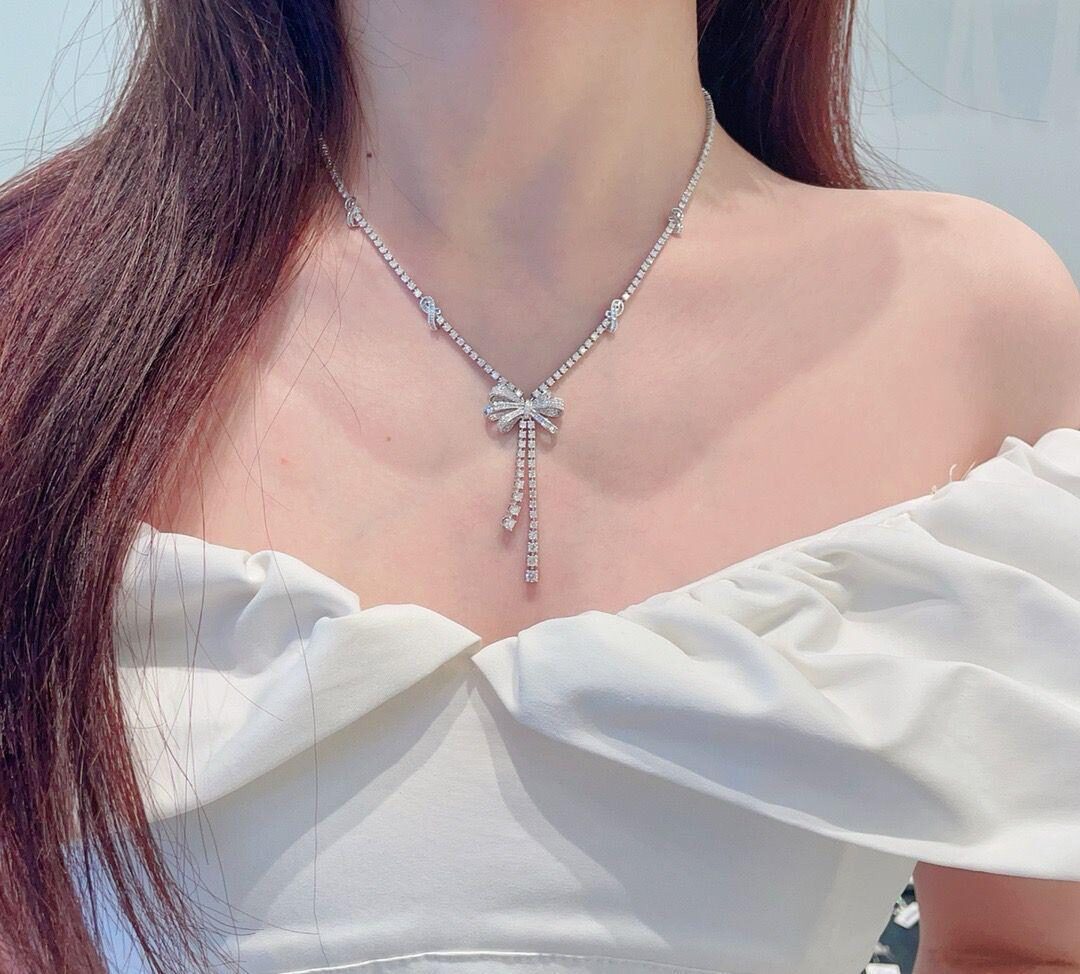 Diamond ribbon pendant necklace